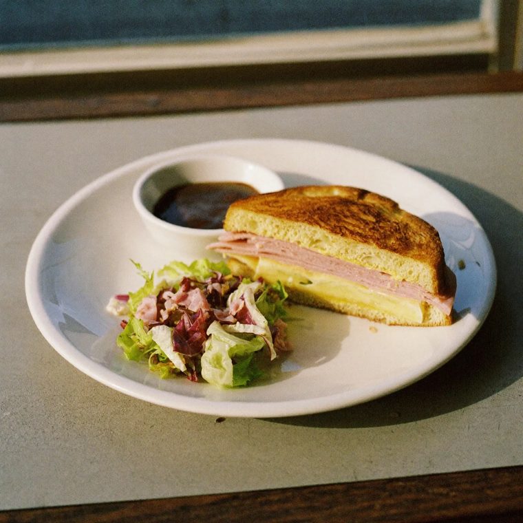 A toasted cheese and ham sandwich